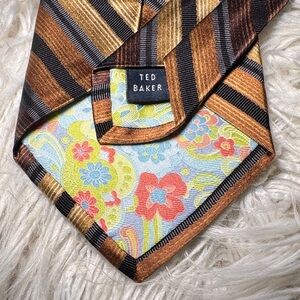Gorgeous Ted Baker Men's Striped Tie in Black, Brown, and Gold Stripes